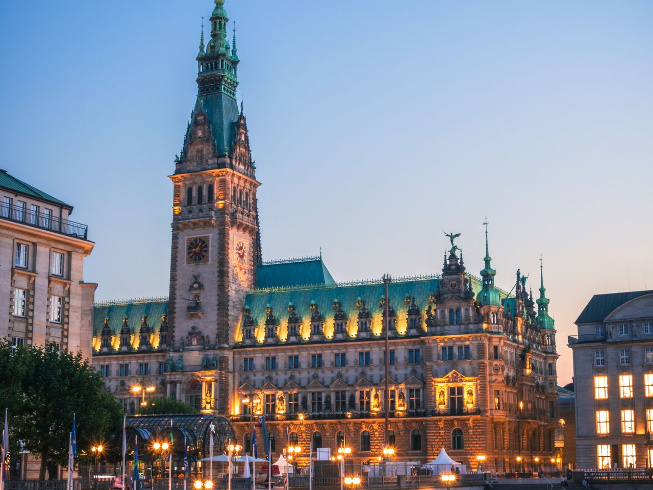 Historic town hall beside a canal; illustrative architecture photograph
