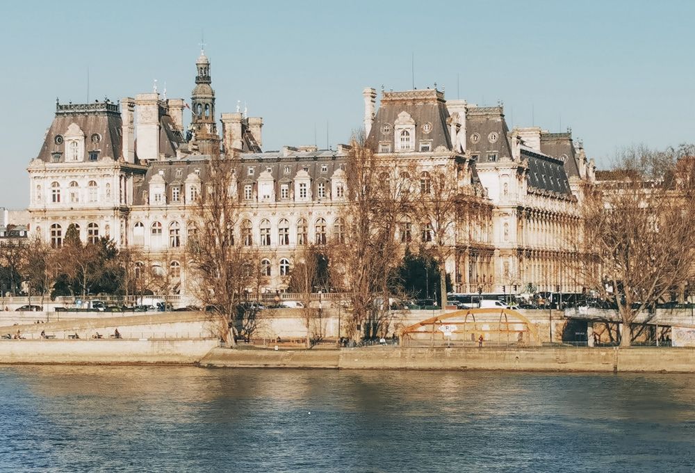 Historic civic architecture beside the River Seine; illustrative photograph